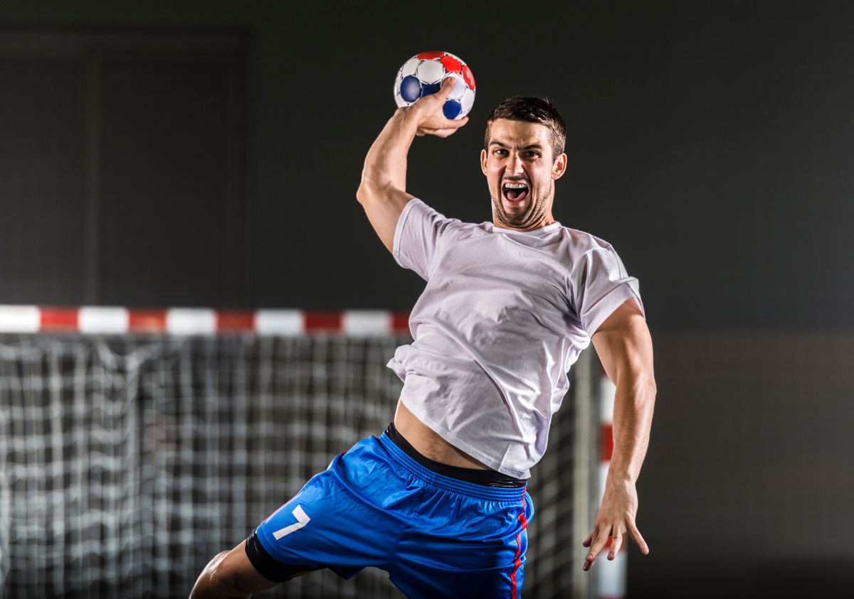 Aggressive handball player.